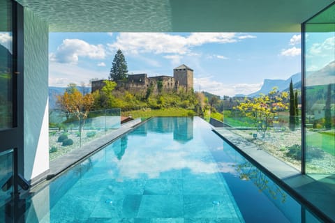 Indoor pool, outdoor pool, open 7:00 AM to 7:00 PM, pool umbrellas