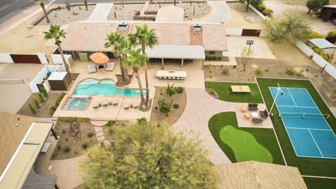 Backyard Aerial | Private Pool and Spa | Outdoor Lounge Seating | Dining Area and Entertainment Spaces