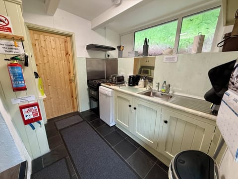 Kitchen with door leading to bathroom