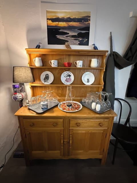Dresser equipped with dinnerware
