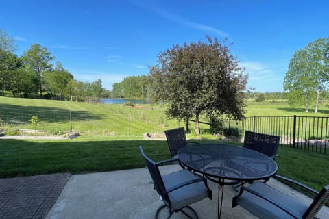 Enjoy your morning coffee or evening meal on the private patio overlooking the peaceful pond.