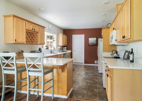 Two additional dining spots at the countertop. Plenty of space to prep meals!