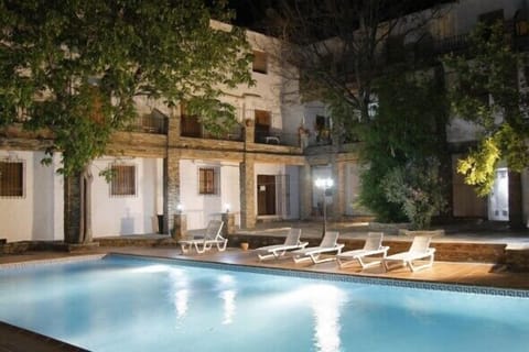 Seasonal outdoor pool, open 11:00 AM to 8:00 PM, sun loungers