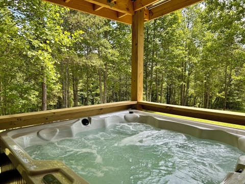 Outdoor jacuzzi with beautiful forest view