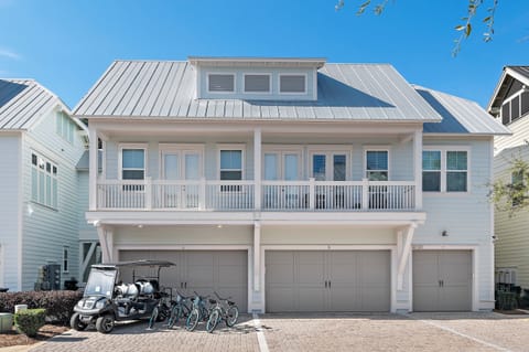 A bright, classic 30A beach home at Prominence with a golf cart and beach cruisers included for the whole crew.