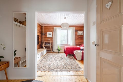 Step into a perfect blend of history and modern comfort, where authentic log walls meet bright, contemporary living.