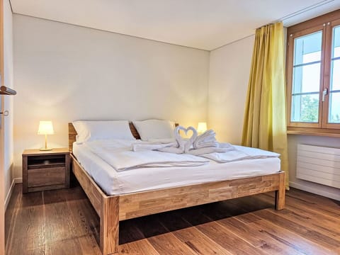 Bed, Furniture, Interior Design, Floor, Flooring, Bedroom, Wood Flooring, Bedding, Bed Sheet, Wood