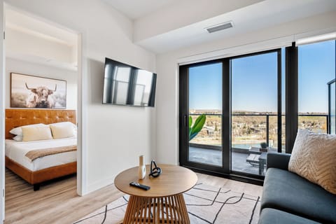 Welcome home! Gorgeous view of the Bow River and Princes Island Park from this stylish and comfortable condo 