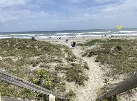 Beach access is only a short stroll from the condo. 