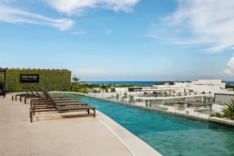 Poolside Paradise. Dive into relaxation with a stunning pool view.