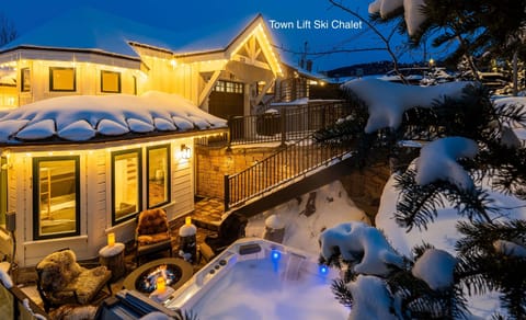 Town Lift Ski Chalet spa patio with ice-melt deck
