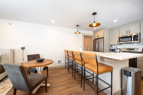 Additional seating is available at the spacious kitchen bar | Main Level