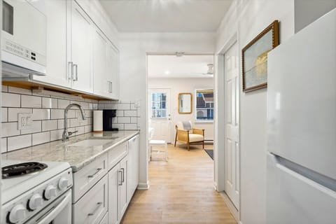 Seamless flow from kitchen to living area.