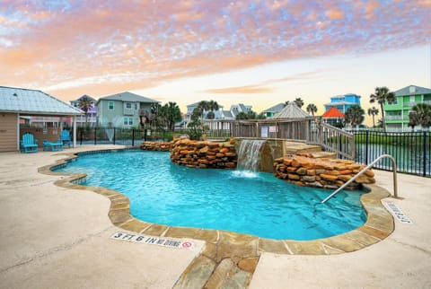 Kick back and relax by the communal pool area.