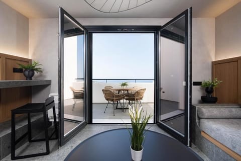 Dome Suite with Hot Tub and Sea View | Living area | TV
