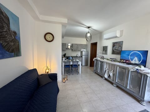 Furniture, Flooring, Floor, Apartment, Couch, Chair, Living Room, Coffee Table, Sofa Bed