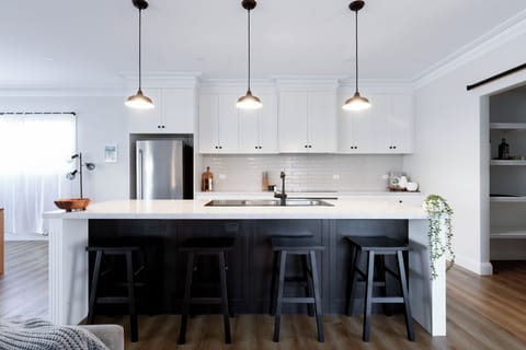 Bright, modern kitchen with island seating