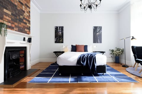 Beautifully restored room with moody blue accents
