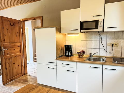 Kitchen, Kitchen Appliance, Cabinetry, Countertop, Furniture, Major Appliance, Flooring, Wood, Sink, Kitchen Sink