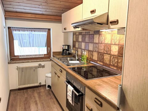 Kitchen, Wood, Countertop, Major Appliance, Kitchen Appliance, Cabinetry, Flooring, Interior Design, Furniture, Floor