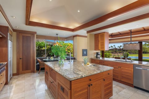 Another angle of the chef’s kitchen—multiple prep zones, top-tier finishes, and views to inspire every meal.