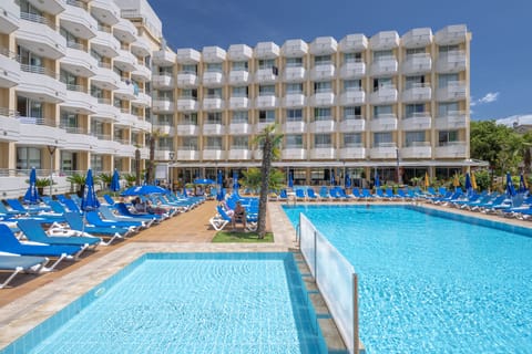 Indoor pool, outdoor pool, open 10:00 AM to 8:00 PM, pool umbrellas