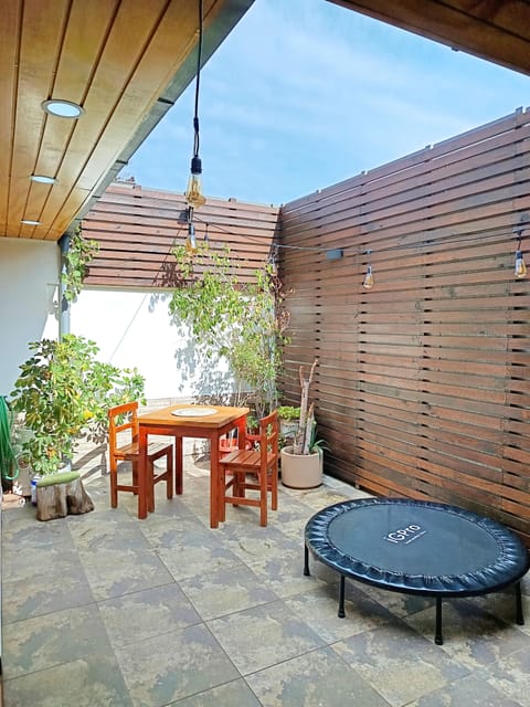 Family Triple Room, City View | Terrace/patio