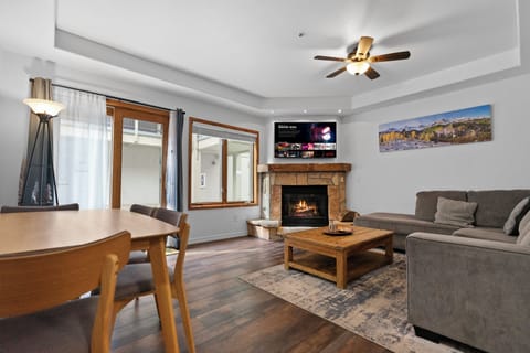 Living room equipped w/Queen Bed Sleeper sofa and Smart TV.