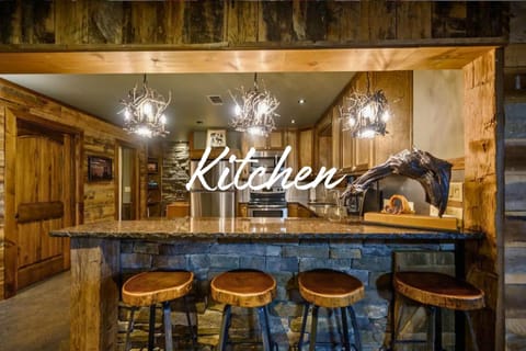 Prepare delicious meals in a kitchen that blends rustic charm with modern functionality.