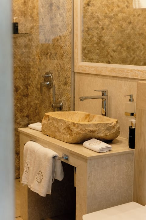 Junior Suite, Balcony, Sea View | Bathroom | Shower, designer toiletries, hair dryer, bathrobes