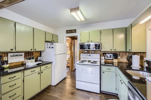 One Particlular Cabin Sink Oven Refrigerator