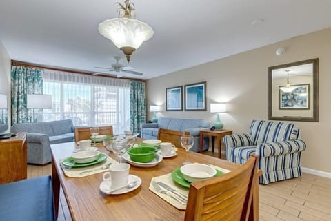 Gather for memorable meals in the inviting full kitchen and dining area, perfect for family gatherings after a day at the beach.