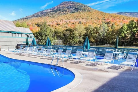 Dive into relaxation at this inviting outdoor pool, surrounded by stunning mountain views and plenty of lounge chairs for soaking up the sun.