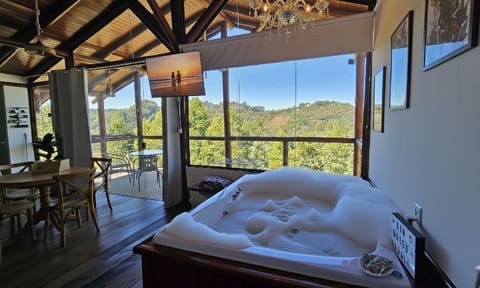 Deluxe Chalet, Patio, Mountain View | Private spa tub