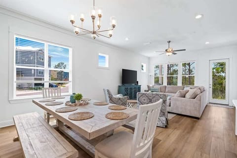 Dining & Living Area: Bright and airy space perfect for gathering and enjoying Gulf views!