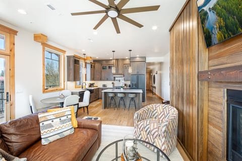 The kitchen, living room & dining area are open concept so your group has plenty of space to connect together | Main Level