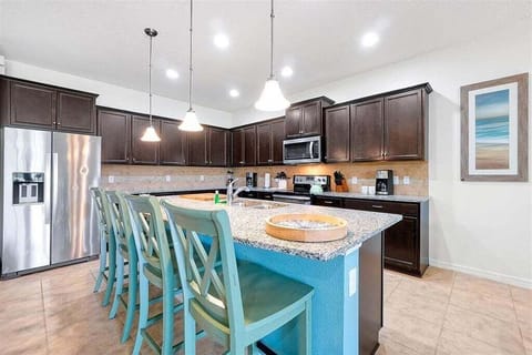 Cook, gather, and enjoy meals together in this open kitchen