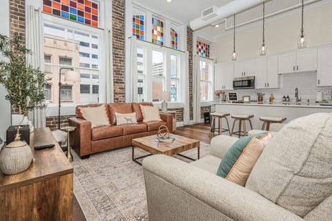 Living Room: Bright space with vibrant stained glass and stylish furnishings, perfect for relaxing!