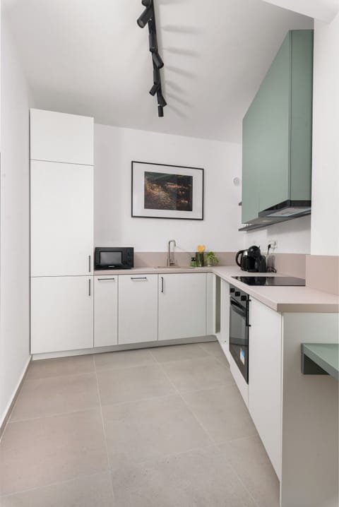 Superior Apartment, Balcony, City View | Private kitchen | Full-size fridge, microwave, oven, stovetop