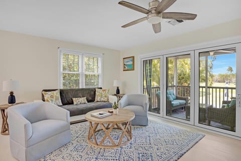 Living area - Slider doors are bi-folds and extend your living space to include screened porch