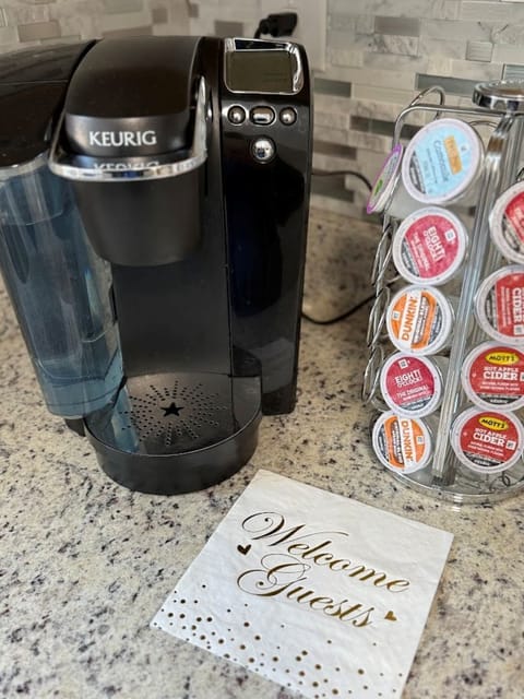 Keurig Coffee Maker and some complimentary coffee pods.
