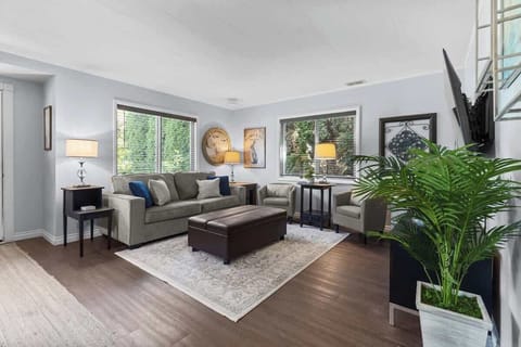 Main living room- Couch pulls out into a twin and the ottoman can be moved and turned into a single bed.  