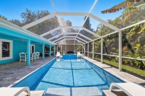 Enclosed pool deck features various dining, gathering and lounging spaces.