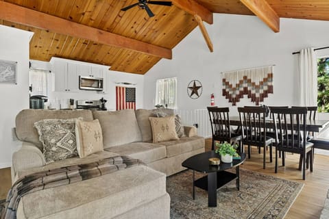 Your new favorite spot — the cozy couch in the living room.