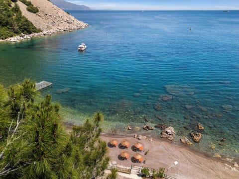 Private beach nearby, sun loungers, beach umbrellas