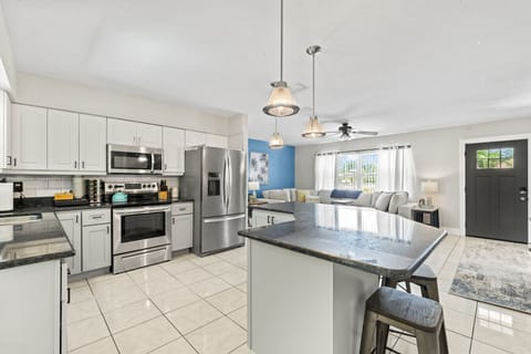 Kitchen View Overlooking Living Room and Front Door