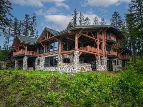 Ridge Top Lodge is a picturesque log mountain home - a perfect Montana getaway | Exterior