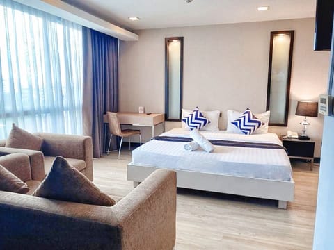 In-room safe, laptop workspace, blackout drapes, soundproofing