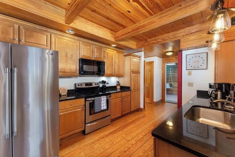 Cook like a pro in this fully stocked kitchen, featuring high-end appliances, ample cabinetry, and plenty of space to create your culinary masterpieces.

