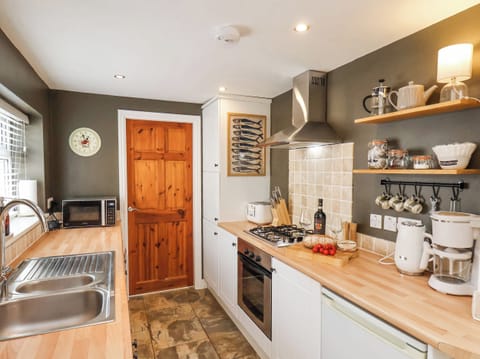 Fridge, microwave, toaster, cookware/dishes/utensils
